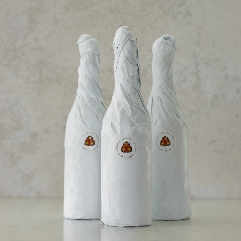 Dunnolly bottles wrapped in tissue